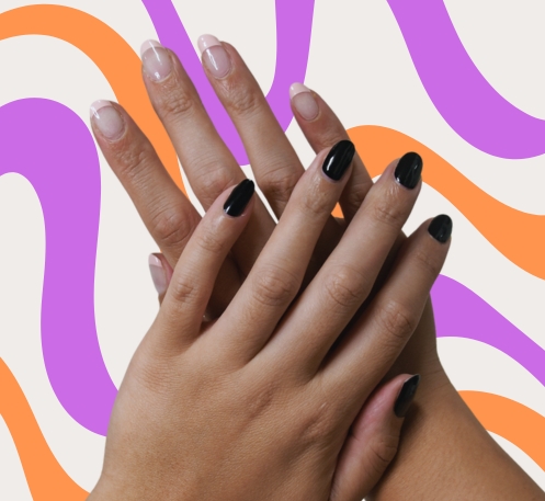 Plain black gel nail wraps on left hand and pink french tip gel nail wraps on right hand against a pink, orange and beige background.